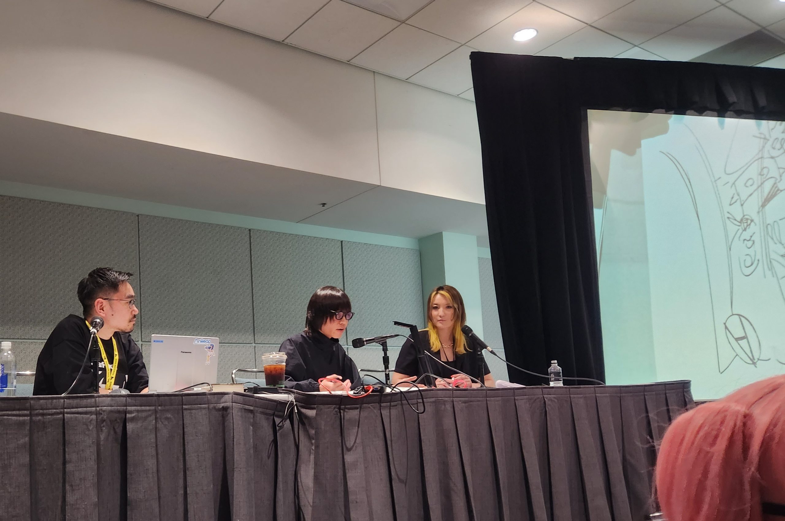 Jun Inagawa and staff at Anime Expo 2023